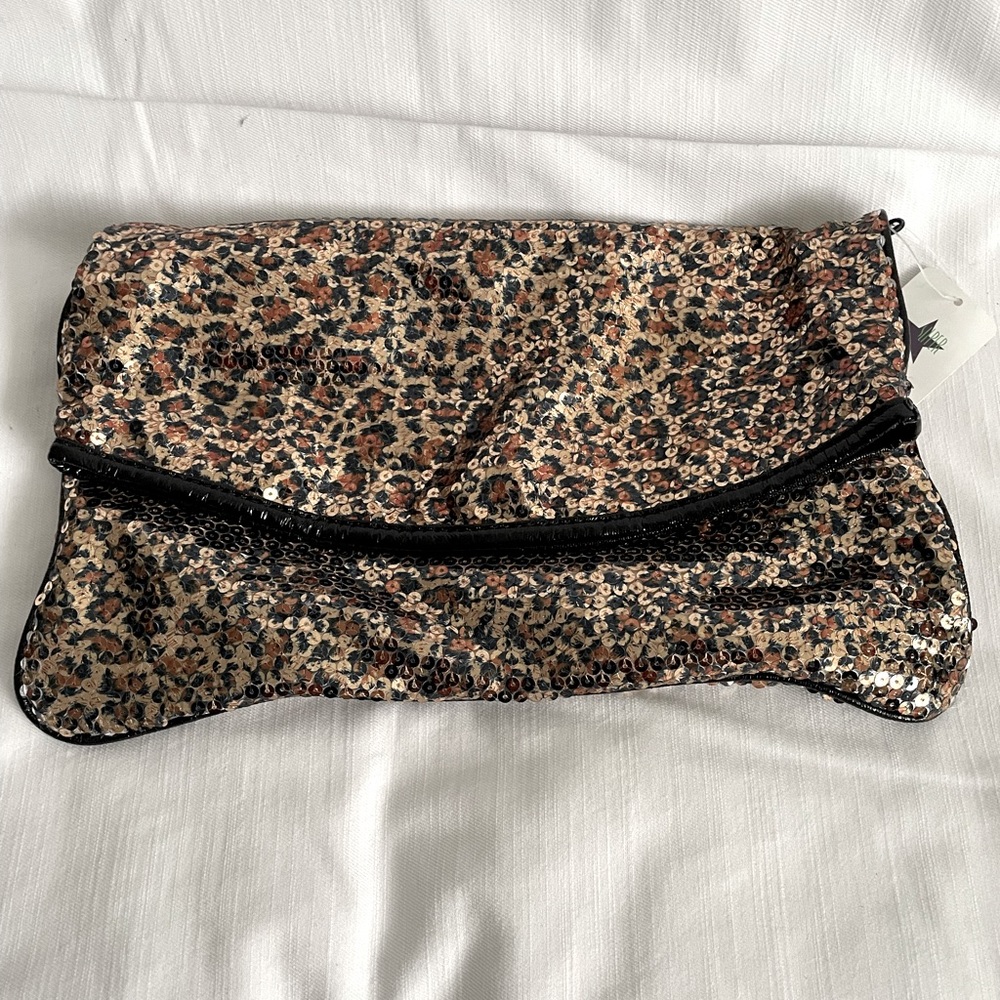 Fold over sequenced handbag